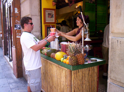 Me buying smoothies at a place close to our hotel.
