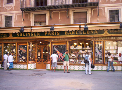 Me checking out a cutlery store off La Rambla.