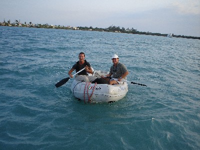 us paddling the dink with broken paddles. 