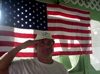 This was at George's Kitchen, one of our more regular dining places while in San Pedro. They have a huge american flag beach towel hanging on the wall behind me one time when we ate, thus setting up this very patriotic shot, I suppose. Uh, Semper Fi? me saluting...