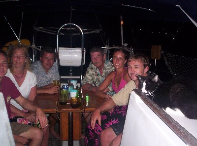 Here we are having after-dinner cocktails (many, many of them I might add) onboard Andiamo on Xmas Eve. This ended up being a wonderful night, afterwards we went into town and partied and danced until something like 4 AM. Truly a Xmas to remember. Cocktails with Howard, Bonnie, Vanessa and the whole gange after Xmas Eve dinner.