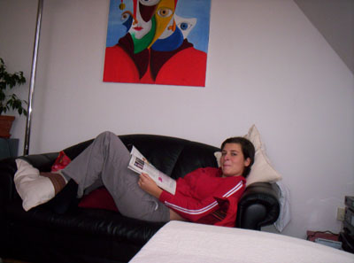 Miriam lazing at home.