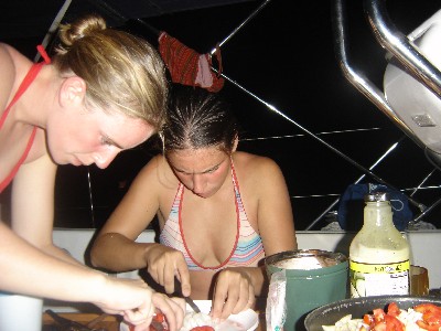 Miet and Saartje prepare dinner in the cockpit