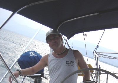 Me, at the helm while we're sailing along