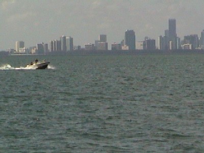 A look at Biscayne Bay and the Miami skyline, and one of many speeding powerboats that we had to dodge and avoid...