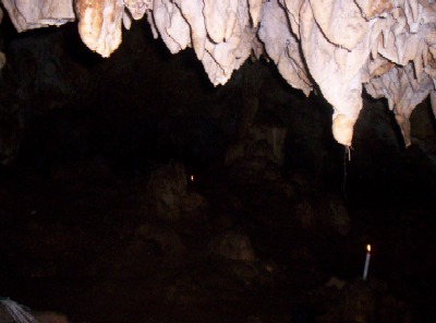This is more or less at the actual entrance of the caverns where you have to do a bit of crawling to get into the actual caves where the water is. You can see some of the candles that locals put out to mark their paths. the narrow and dark entrance